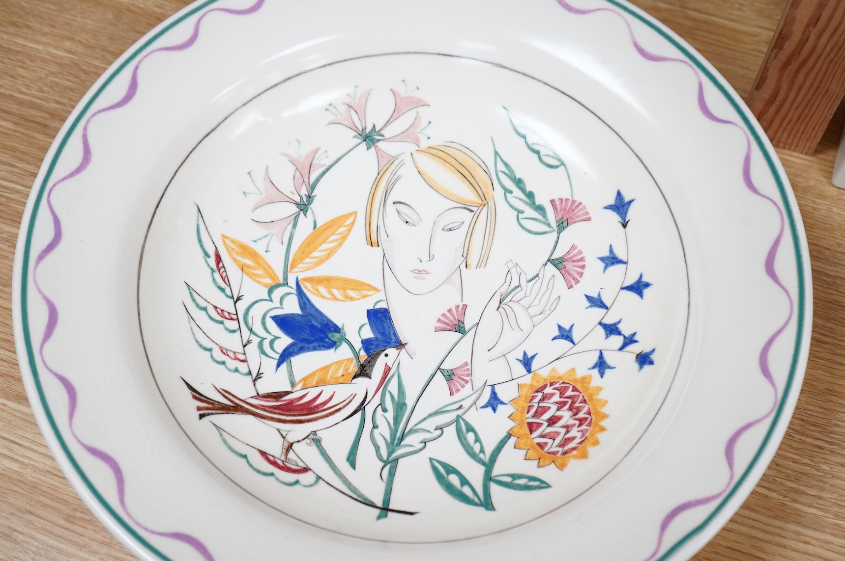 Olive Bourne for Poole pottery ‘sugar for the birds’, a large dish, stamped to the base, 38cm in diameter